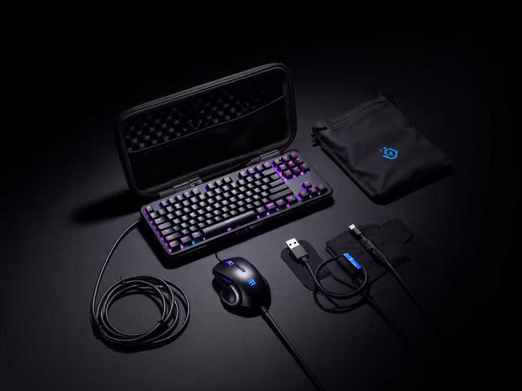 portable_gaming_keyboard_travel_setup_showing_keyboard_in_case_with_mouse_and_cables